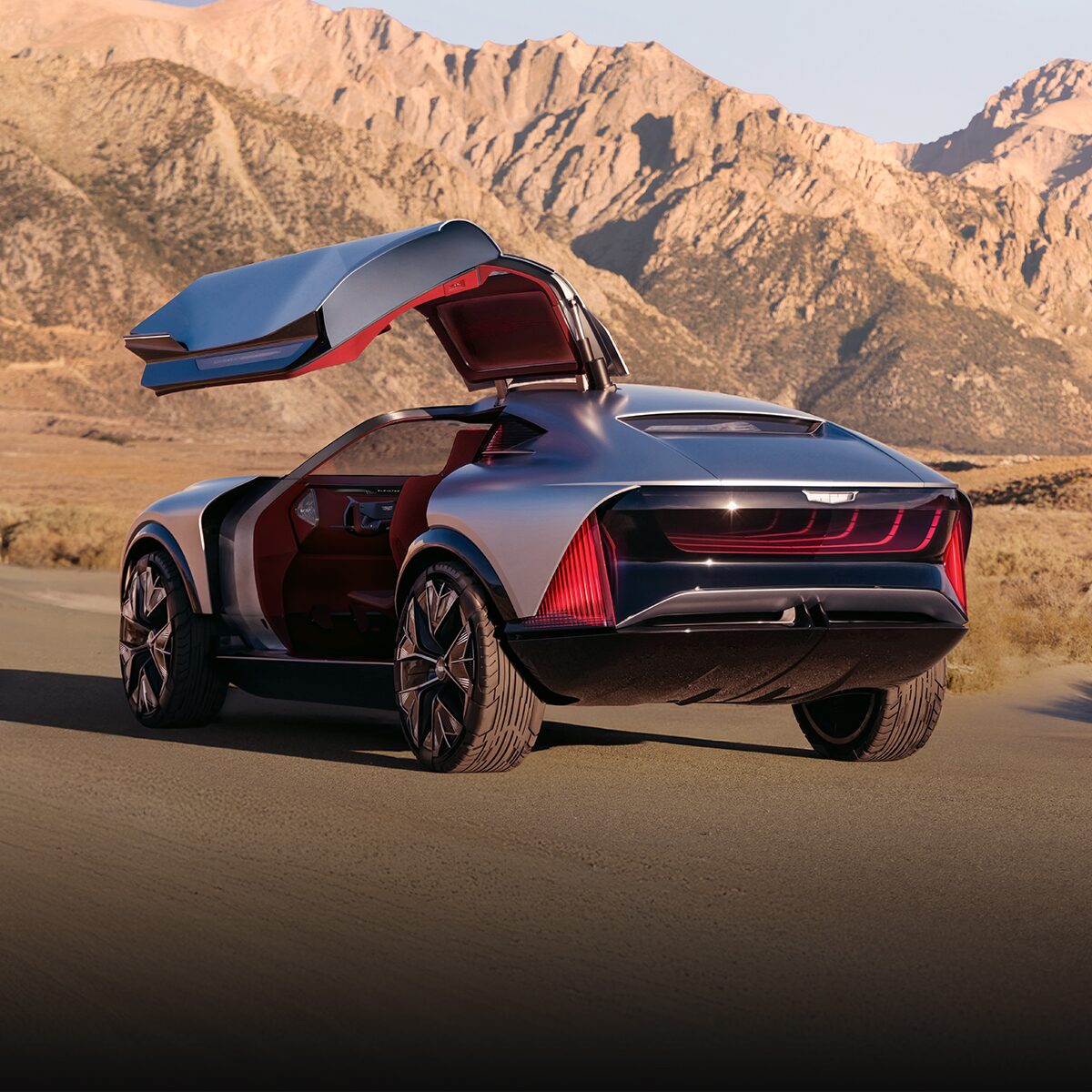 Rear View of the Cadillac Elevated Velocity Concept Vehicle with the Butterfly Doors Open in the Desert
