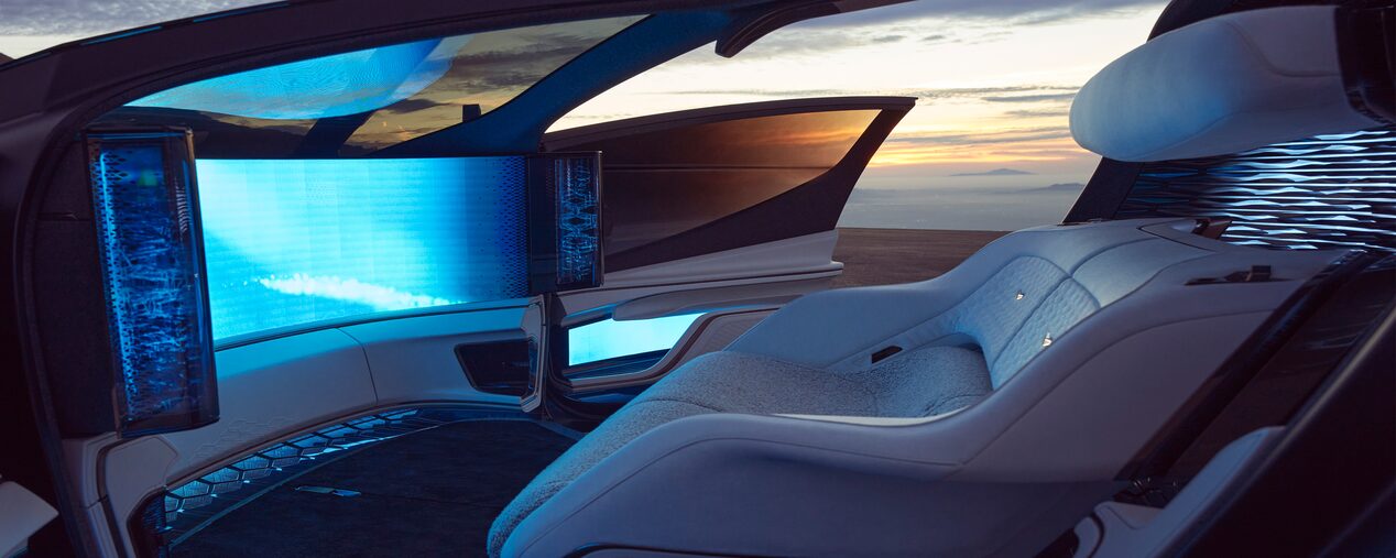 The Cadillac InnerSpace Concept Vehicle Driver Seat Outlooking a Beautiful Sunset