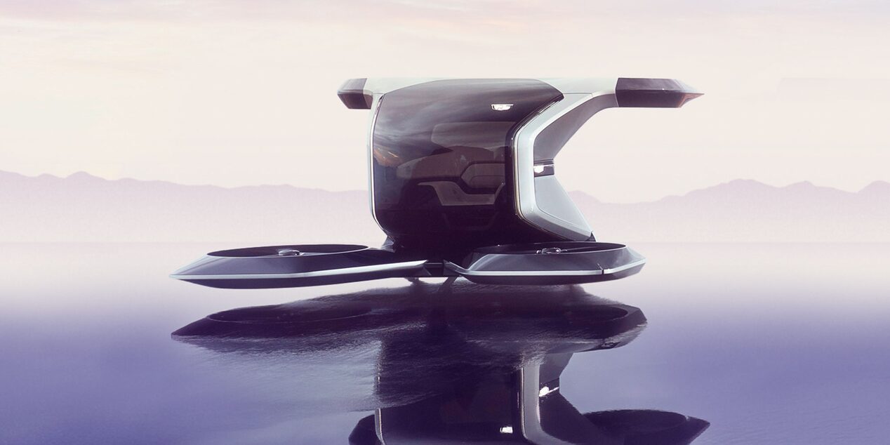 The Cadillac PersonalSpace Concept Vehicle Parked on Reflective Ground