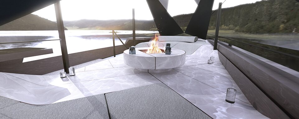 A Fire Pit in the  Cadillac OpenSpace Concept Vehicle Parked near Water