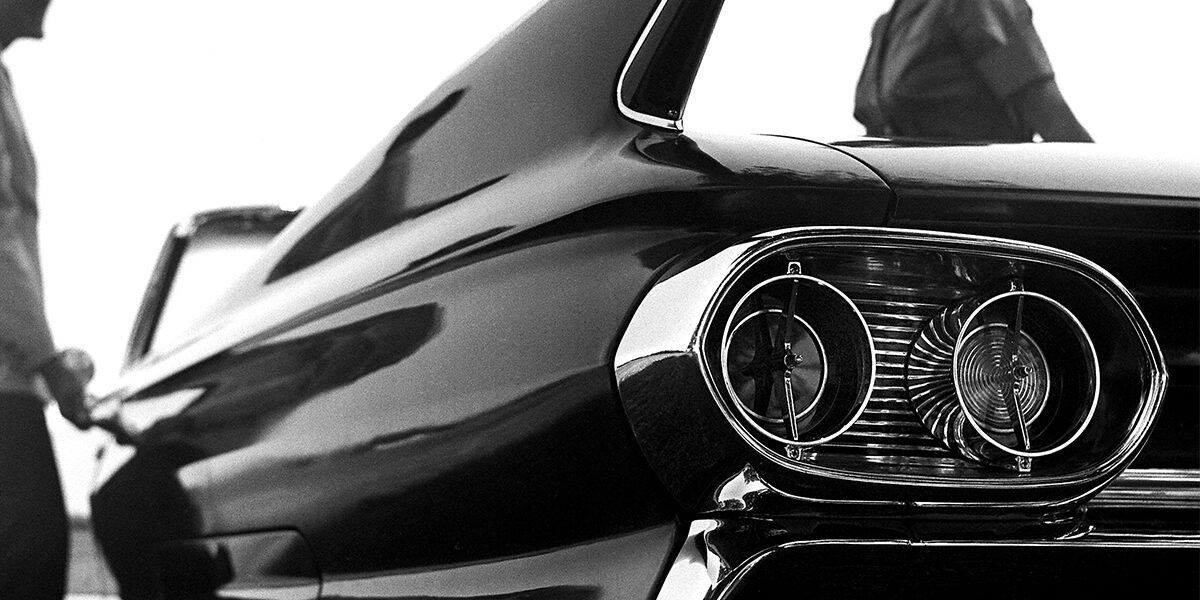 Black and White Close-up of the Tail Lights on a Classic Cadillac