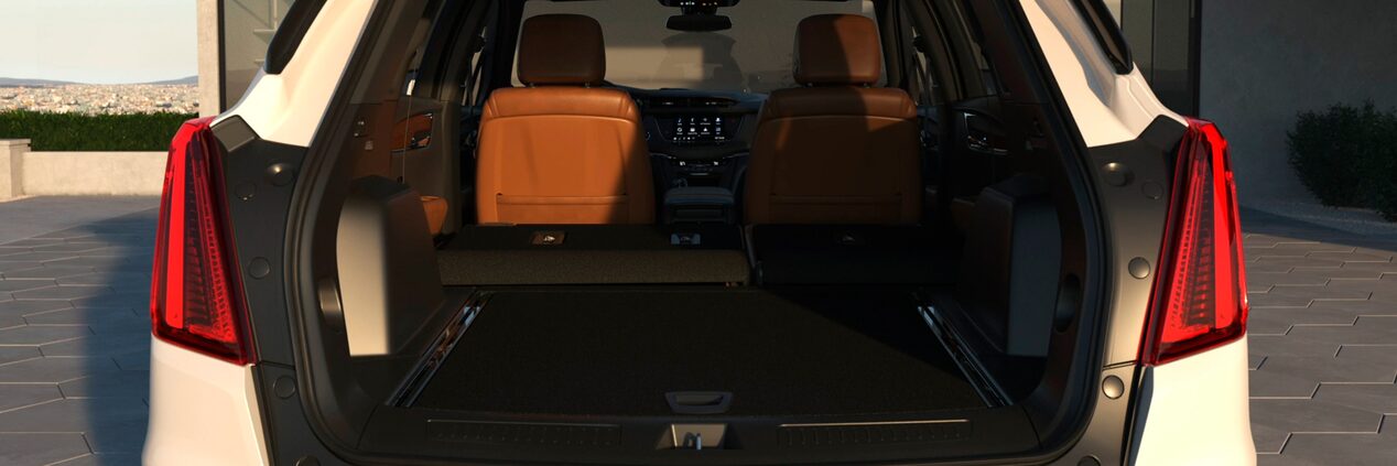 Luggage Organized in Spacious Trunk Cargo Space in the Interior of The Cadillac XT5