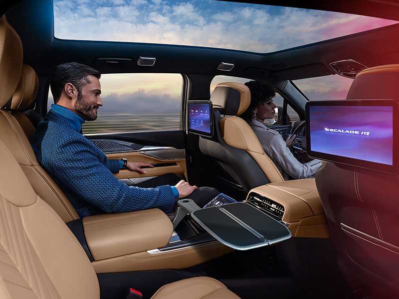 Second Row View of a Man Enjoying the Captain Seats in the 2026 ESCALADE IQ