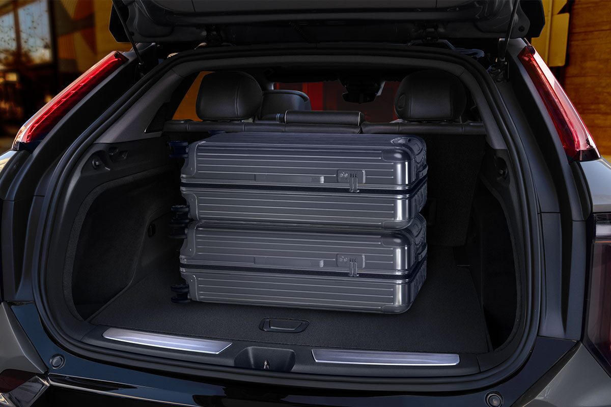 Close-up View of Luggage Stacked in the 2025 Cadillac OPTIQ Cargo Space