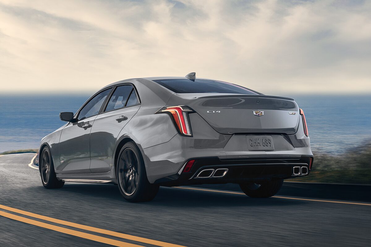 Rear View of the 2025 Cadillac CT4-V Driving by the Beach