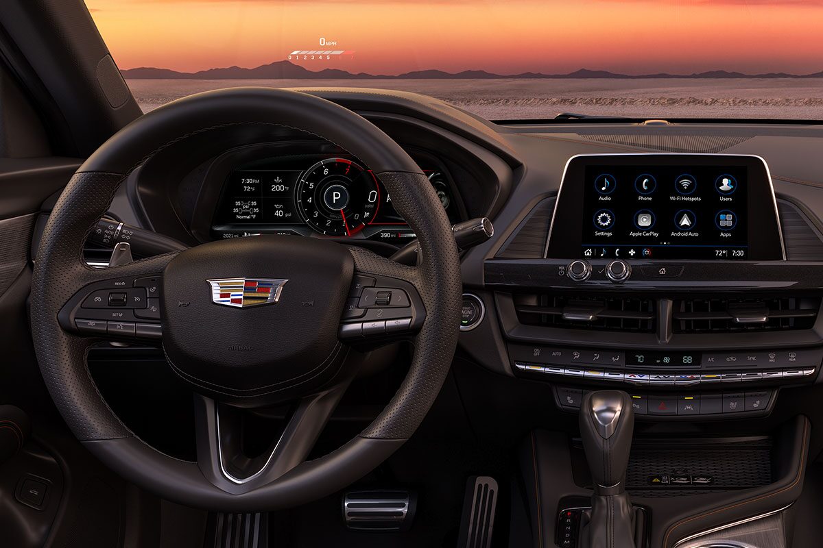 Driver's View of the 2026 CT4 Sleek Infotainment System and Steering Wheel