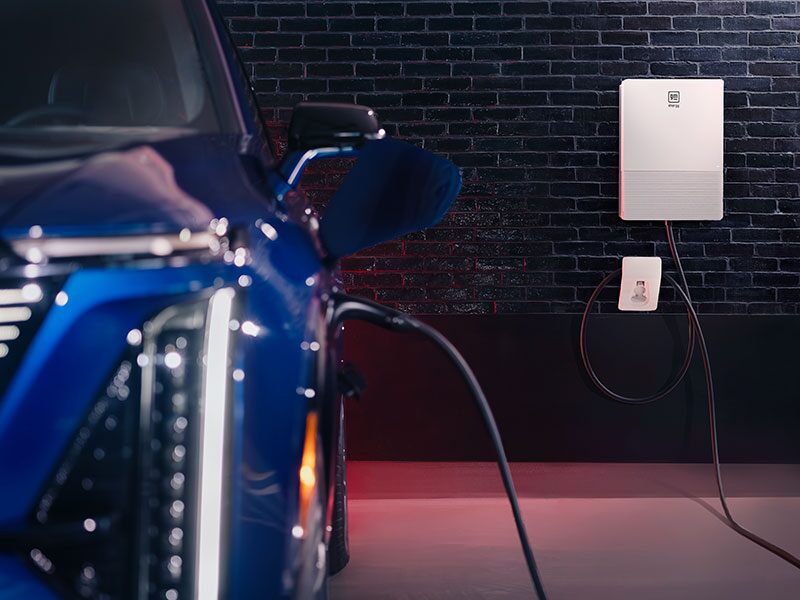 Close-up of a Person Putting the EV Charger into the 2026 VISTIQ's Charging Port