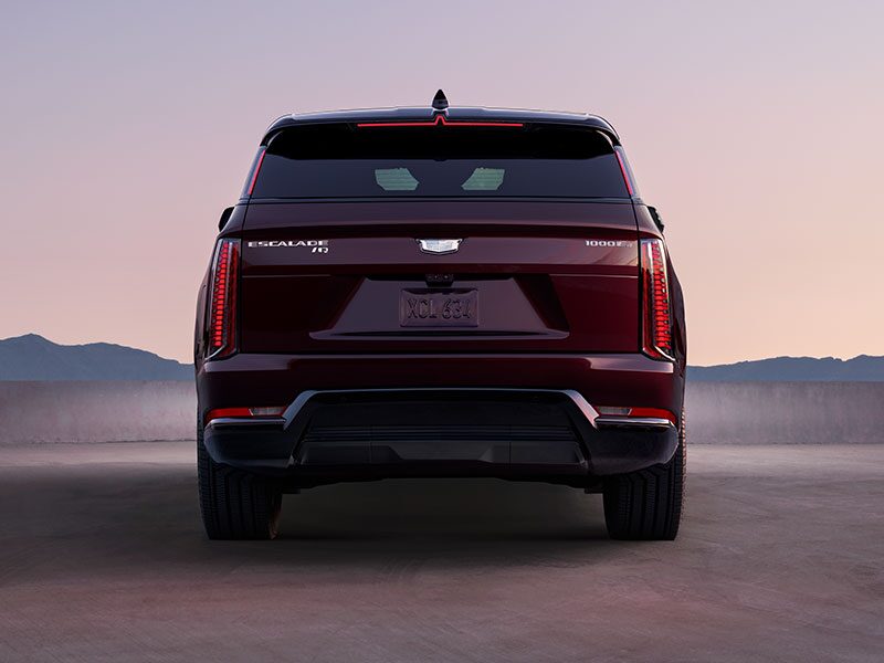 Rear End View of the 2026 ESCALADE IQ Parked in the Desert During Dusk