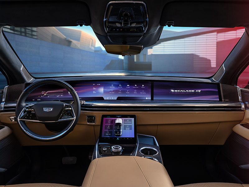 Full View of the 2026 ESCALADE IQ Front Row Interior and Pillar-to-pillar 55" Display Screen