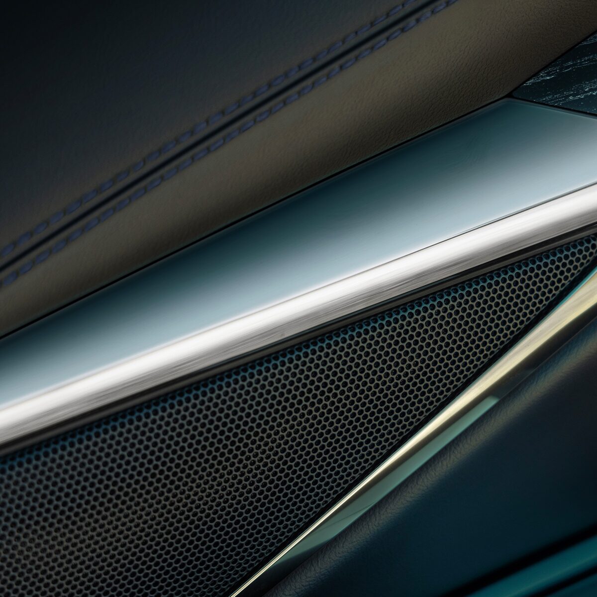 Close-up of the 2026 ESCALADE IQL Door Speaker and Premium Material