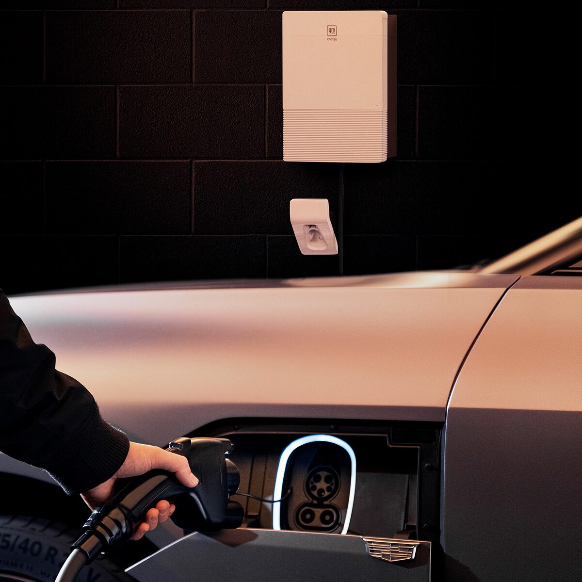 Close-up of Someone Inserting the Charger in a 2026 LYRIQ-V Charging Port