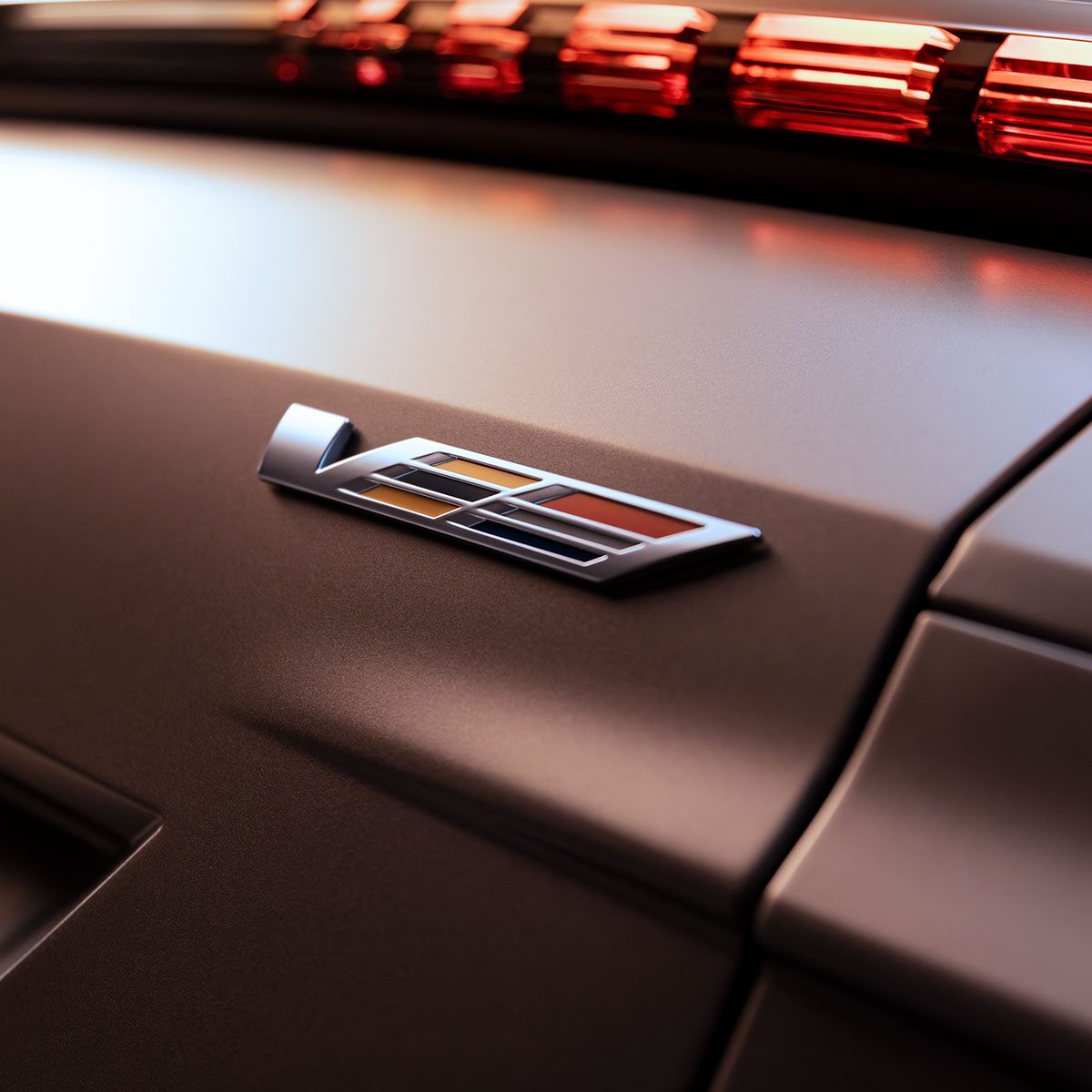 Close-Up View of a V-Series Badge on a Cadillac LYRIQ V-Series Performance EV