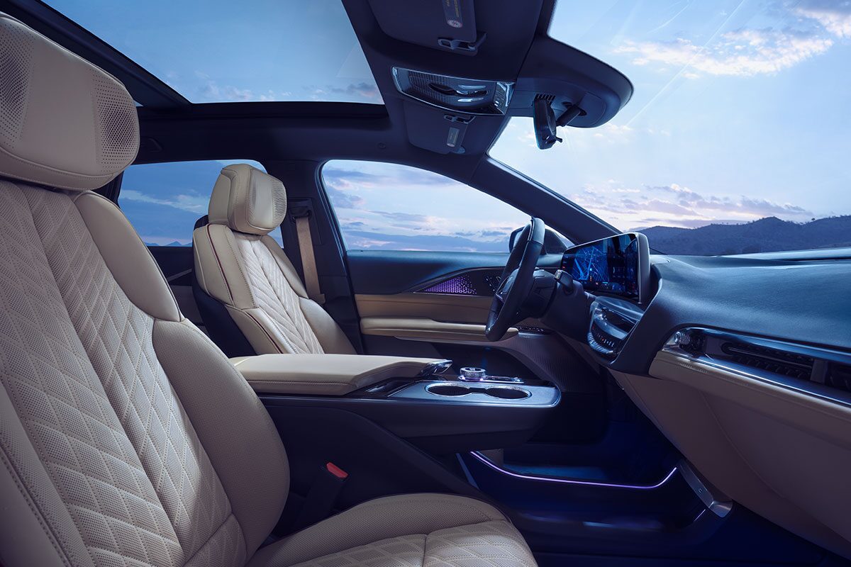 Passenger Seat View of the 2026 LYRIQ Front Row Cabin Overlooking the Mountains