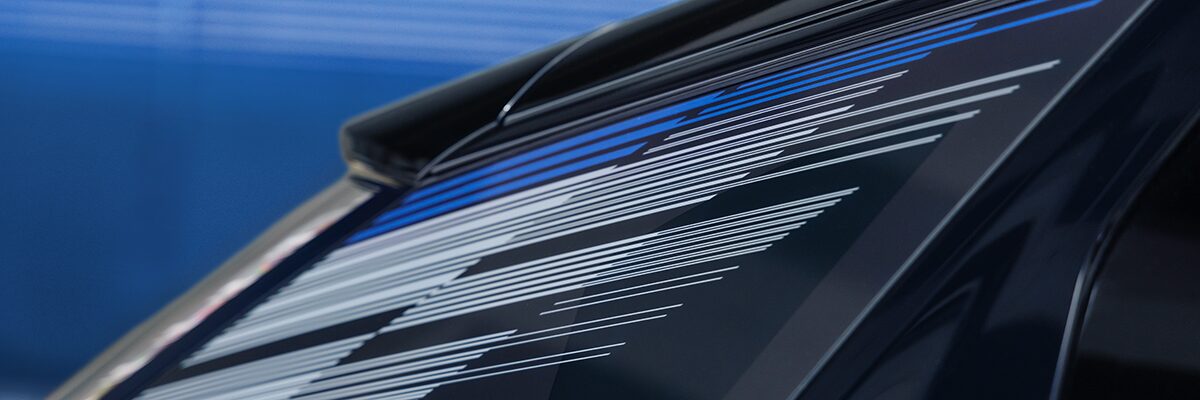 Close-up of the Modern Pattern on the 2026 OPTIQ-V Rear Quarter Glass