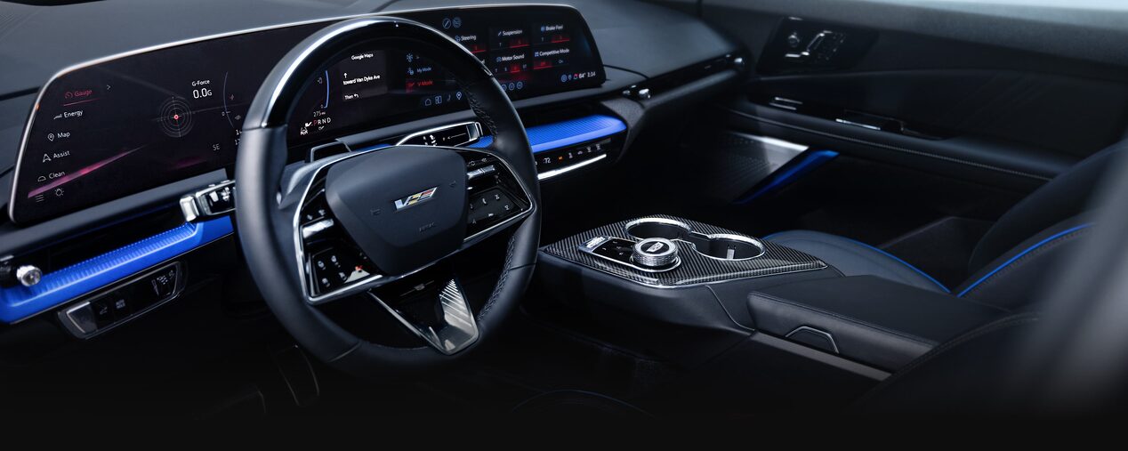 Driver Seat View of the 2026 OPTIQ-V Front Row Interior and Sleek Dashboard