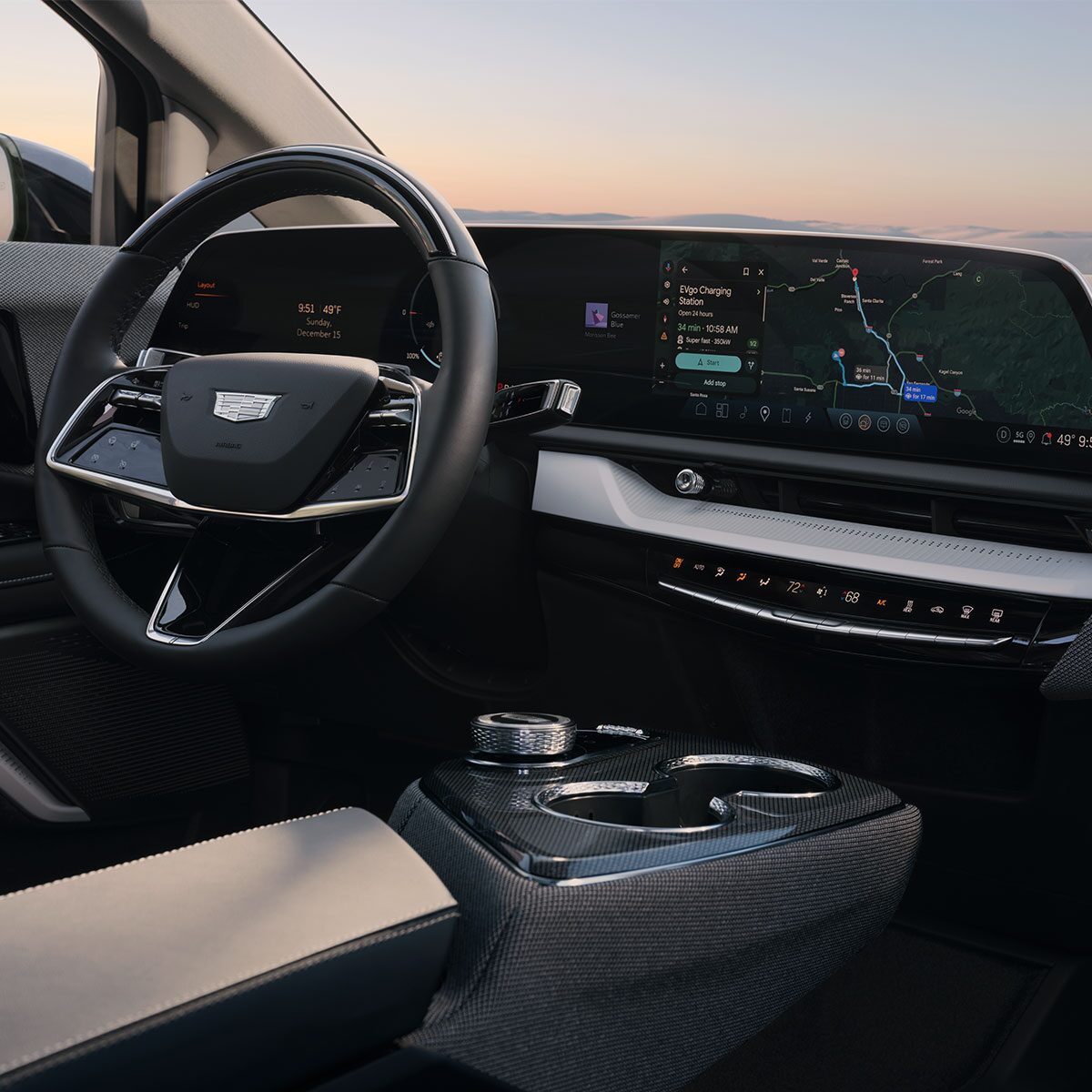 Passenger Seat View of the Steering Wheel and Display Screen of the 2026 Cadillac OPTIQ