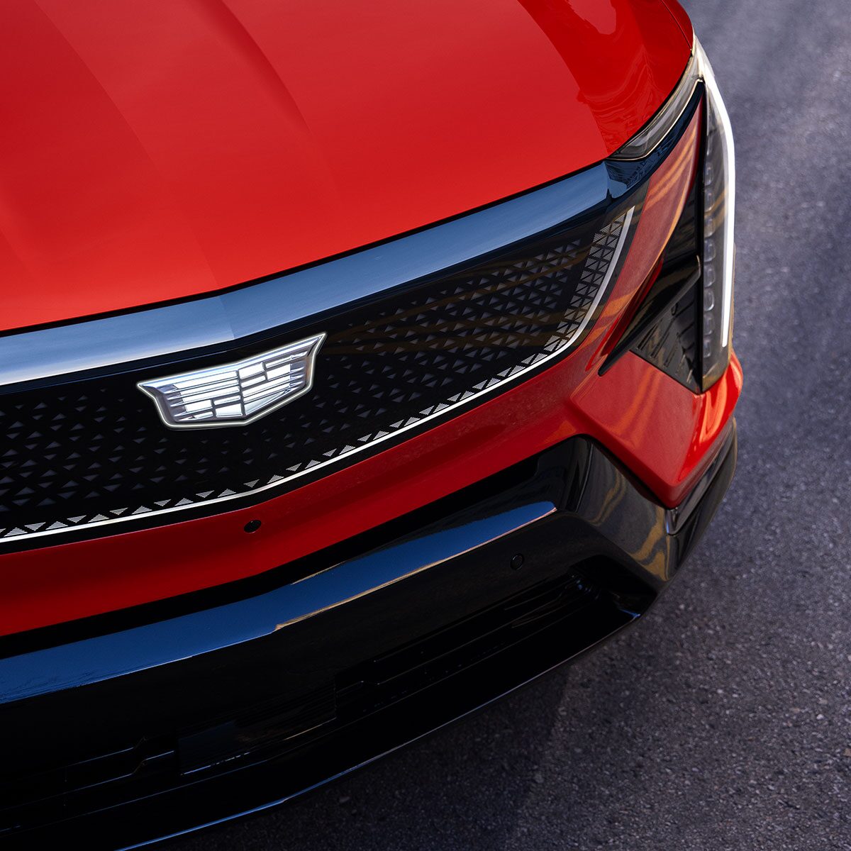 A Close Up View of the 2026 Cadillac OPTIQ Grille and Cadillac Logo