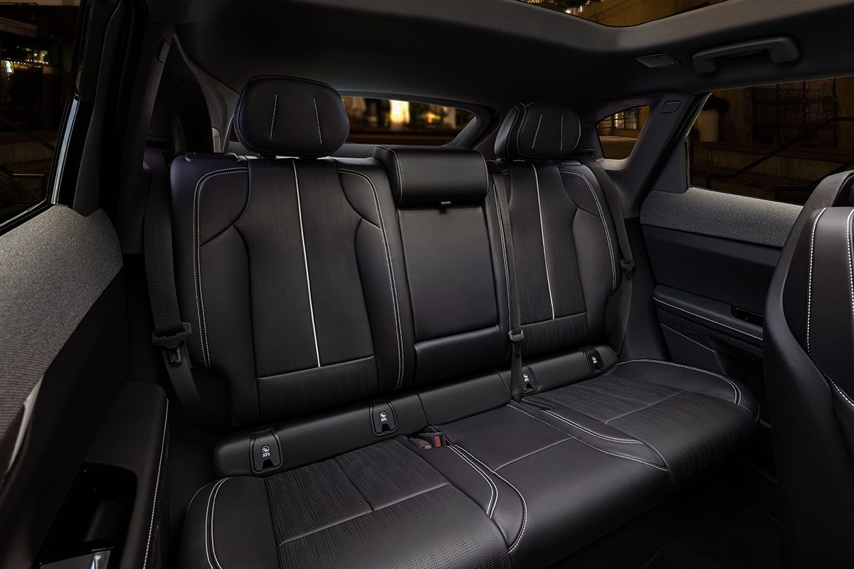 Three Quarters View of Black Back Seats of a Cadillac OPTIQ Vehicle