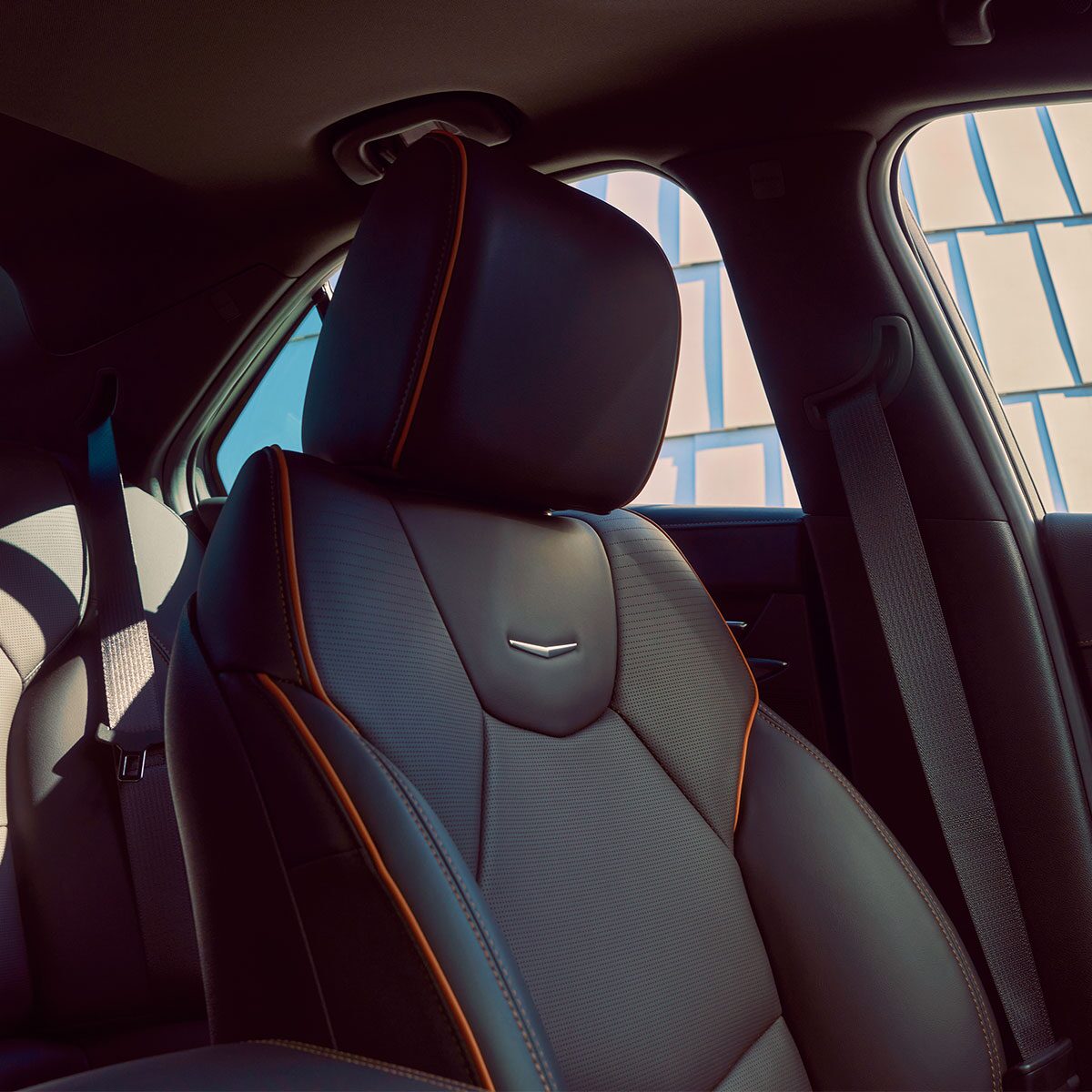 A CT4-V Sport Sedan Black Leather Driver's Seat with Orange Stitching Details