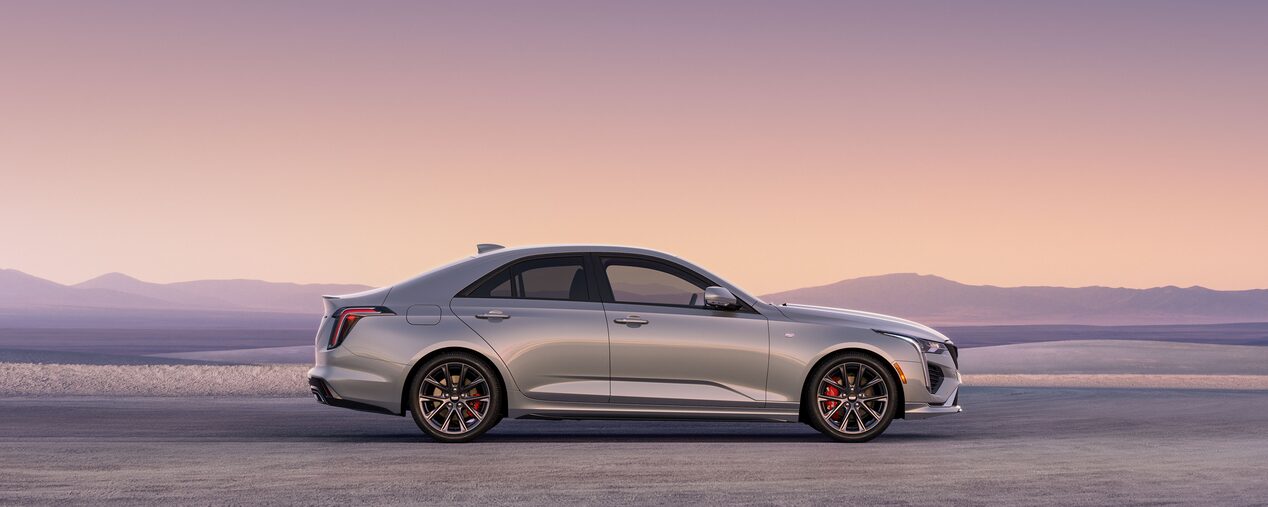 Side Profile View of a Silver 2026 CT4 Parked in the Open Desert