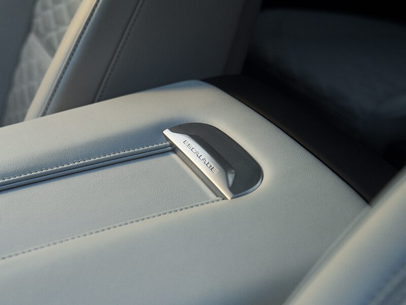 Close-Up of the Escalade Nameplate on the 2026 Escalade's Middle Console