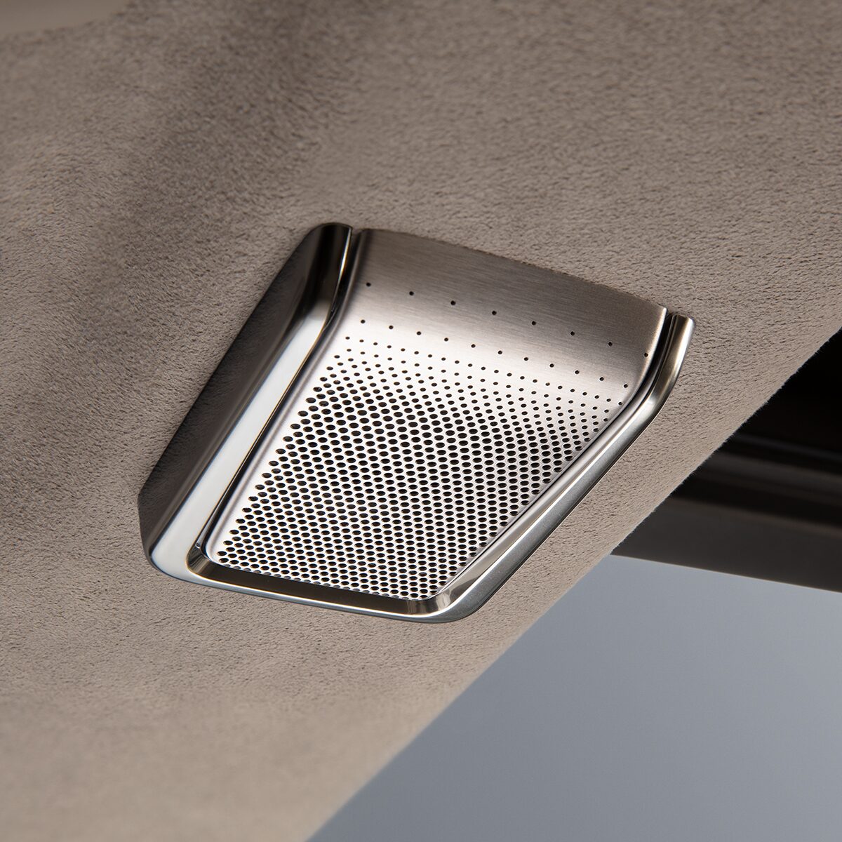 Close-Up View of the 2026 Escalade Back Row Conversation Enhancement Speaker