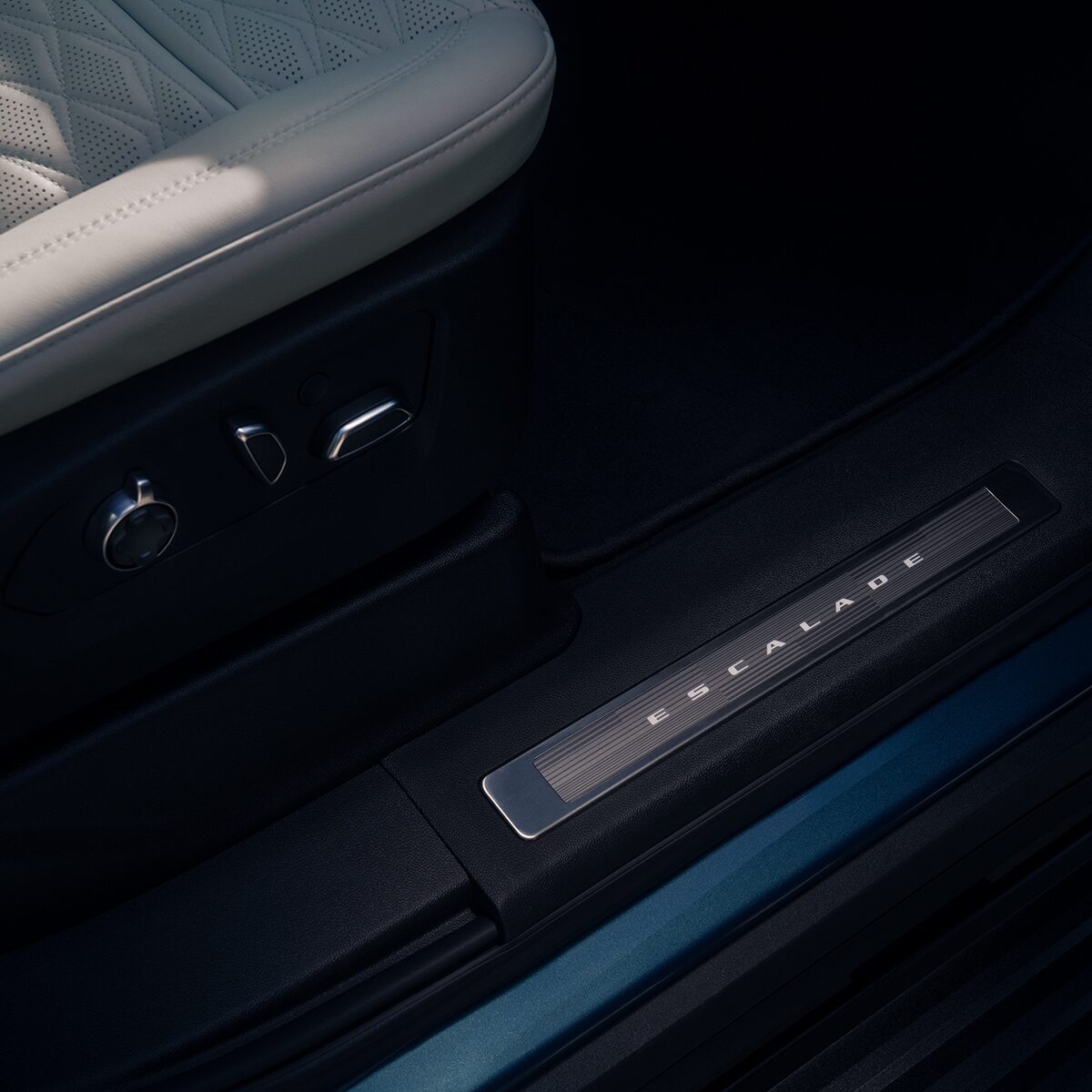 Close-Up of the Cadillac Crest on the 2026 Escalade Interior Door Sill Plate