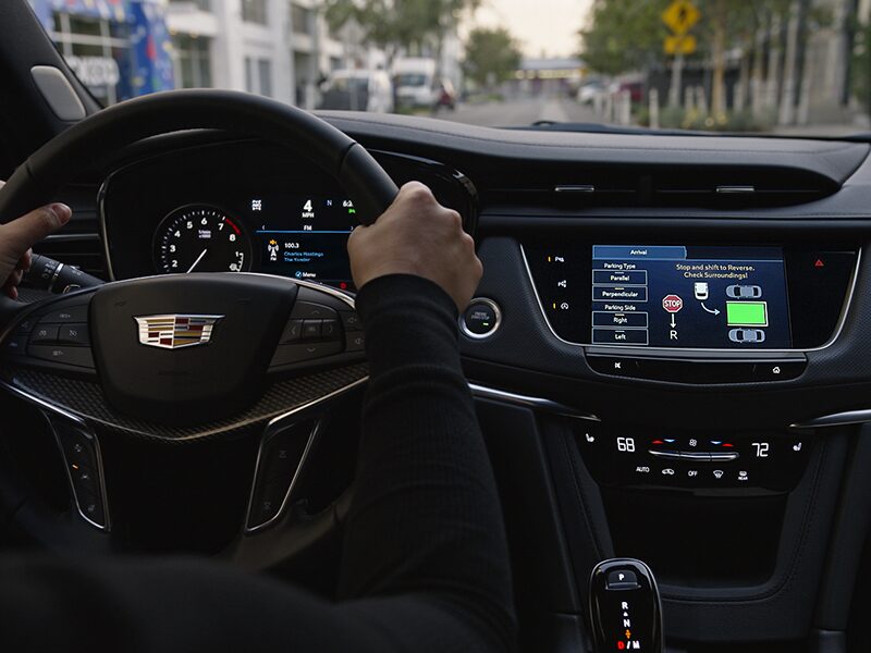  A Man Uses the Automatic Parking Assist Technology of the 2026 Cadillac XT5