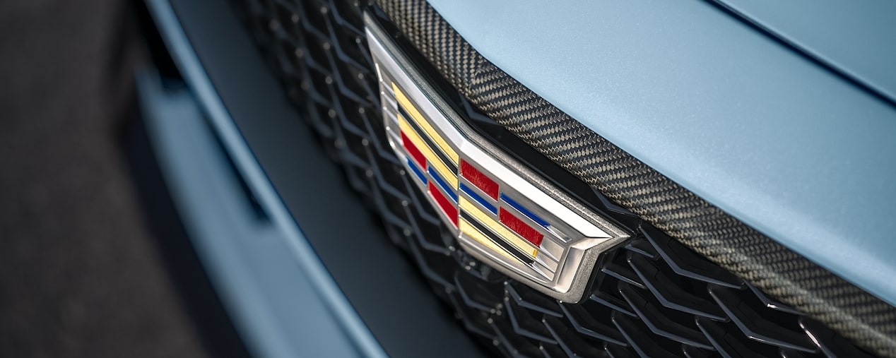 Close-up View of a the Cadillac Logo on the Grille of a Vehicle.