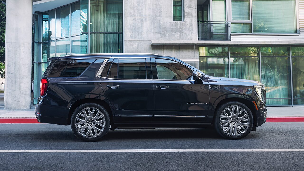 Profile View of a GMC SUV Parked on a City Street
