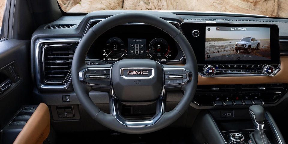 Close-up of the Steering Wheel and Infotainment Screen in the GMC Canyon Truck
