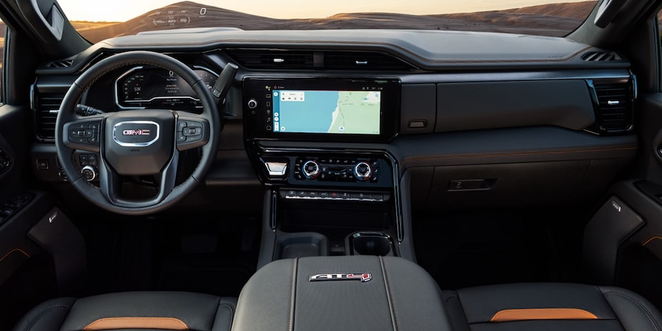 Interior View of the GMC Truck Dashboard with the Infotainment Screen Displaying Maps