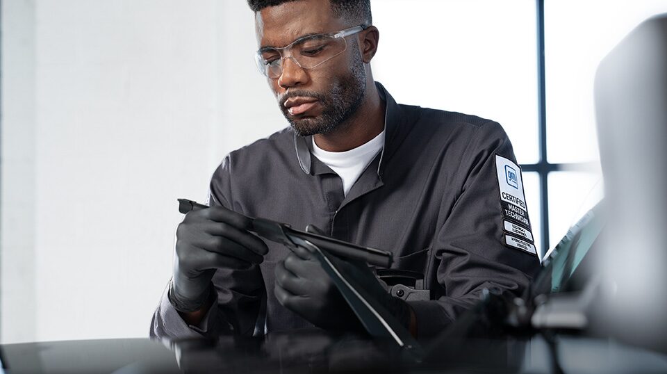 GMC Certified Service Technician Inspecting a Wiper Blade