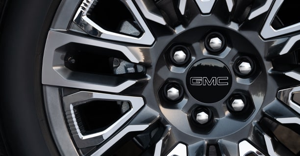 A Close-up of a GMC Wheel and Tire