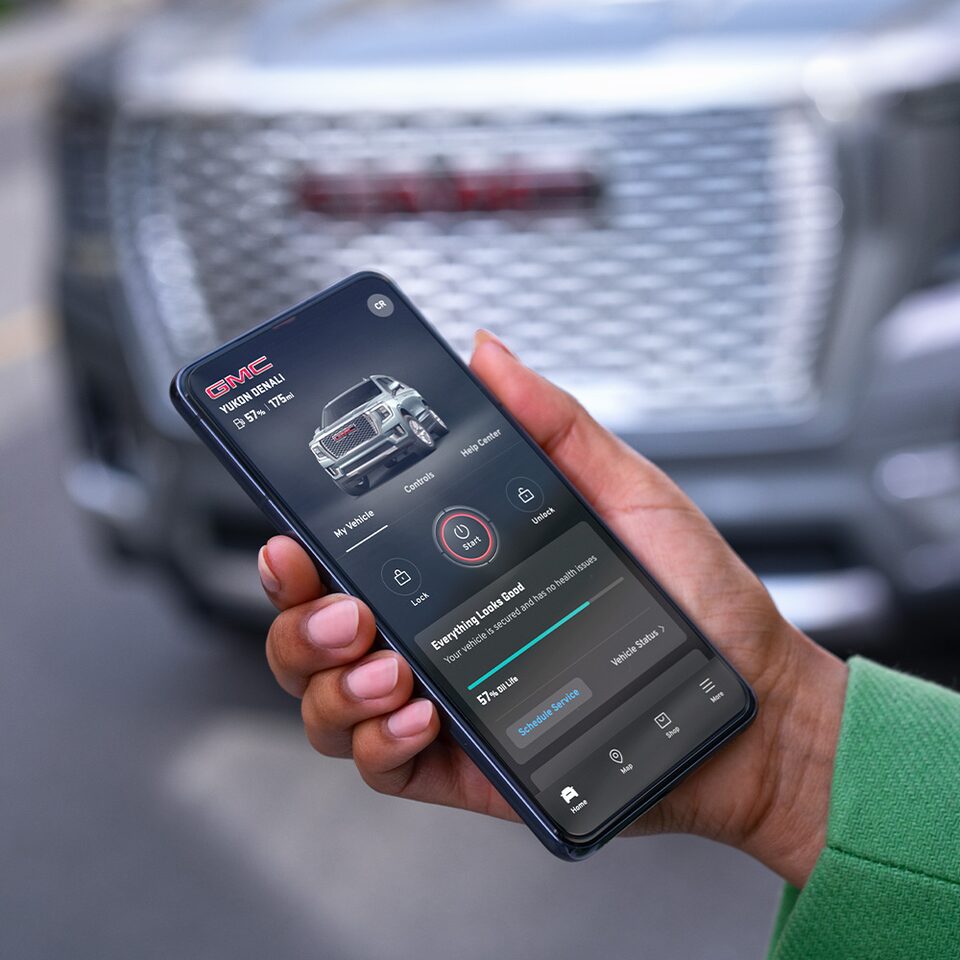 A Man Using the MYGMC Mobile App