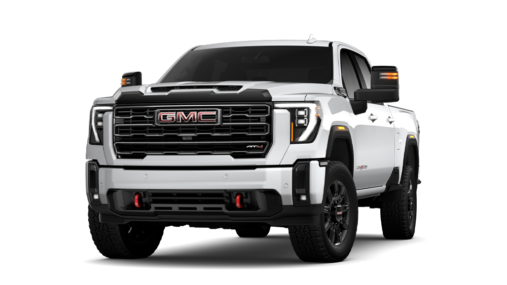 Front Three-Quarters View of the GMC 2026 Sierra HD AT4 Heavy Duty Off-Road Truck in the Color Summit White