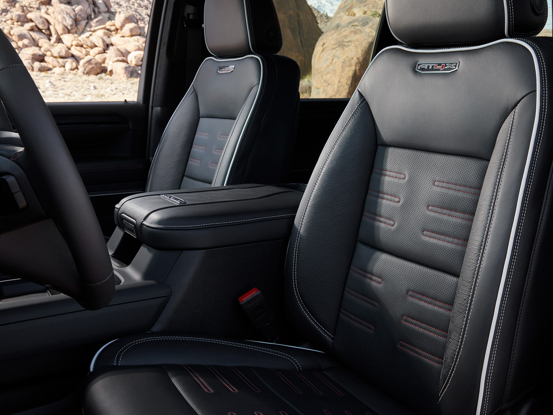 Interior View of the Front Row Seats in the GMC Sierra HD AT4X Heavy Duty Truck