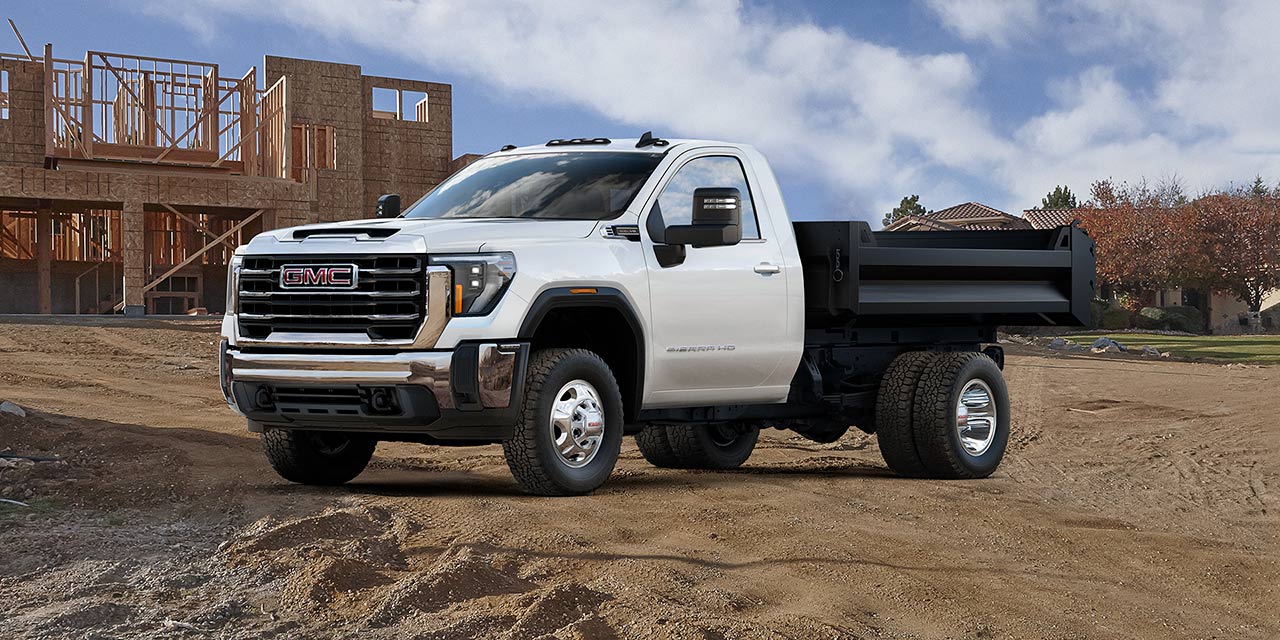 The GMC Commercial Sierra Chassis Cab Parked on a Job Site With Blue Skies Above