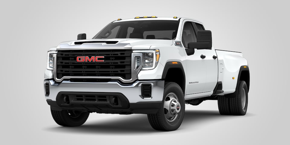 A White GMC Pickup Truck Parked Off-Road