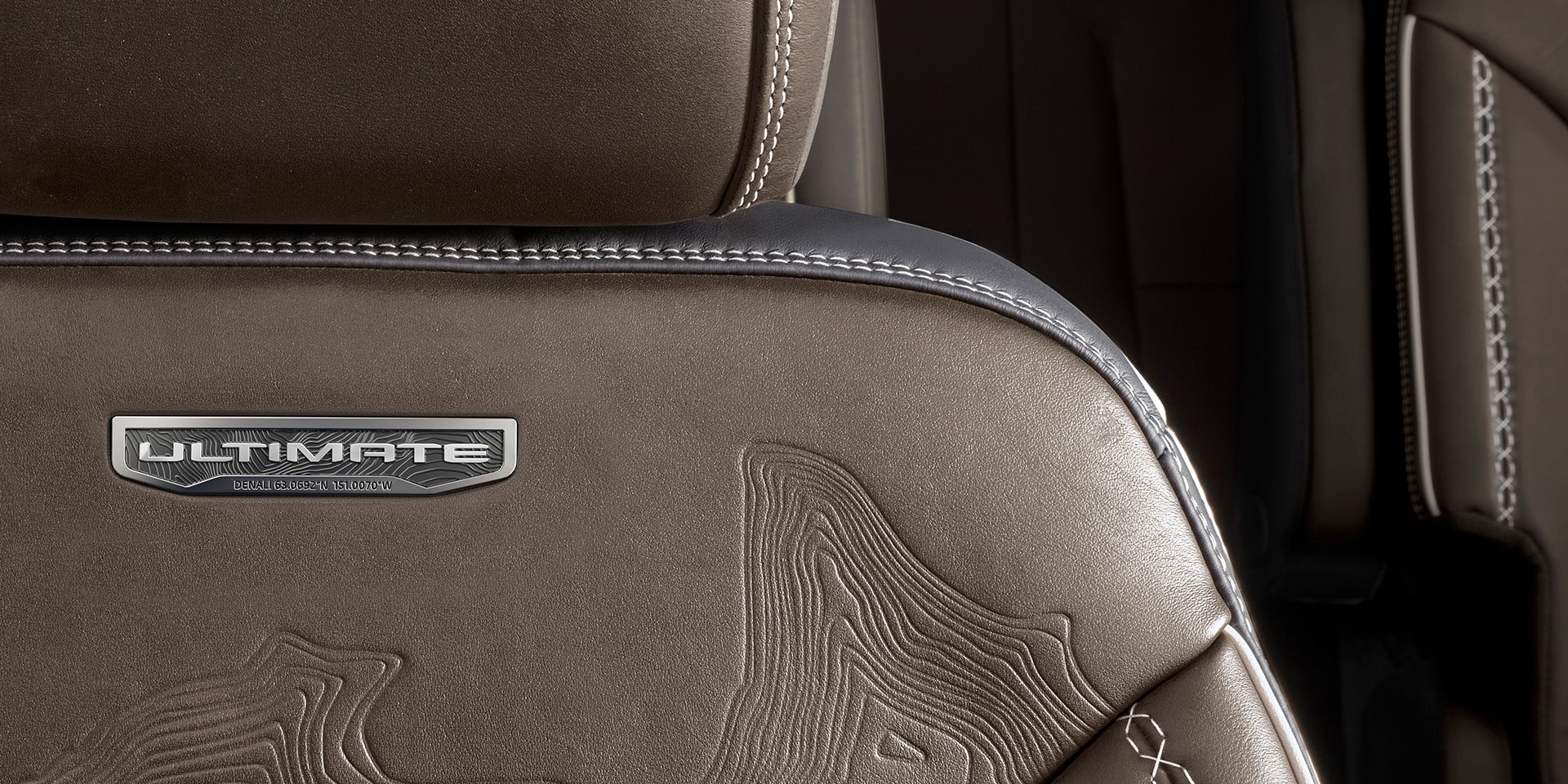 Close-up of the Denali Badging on the Interior Seats of a GMC
