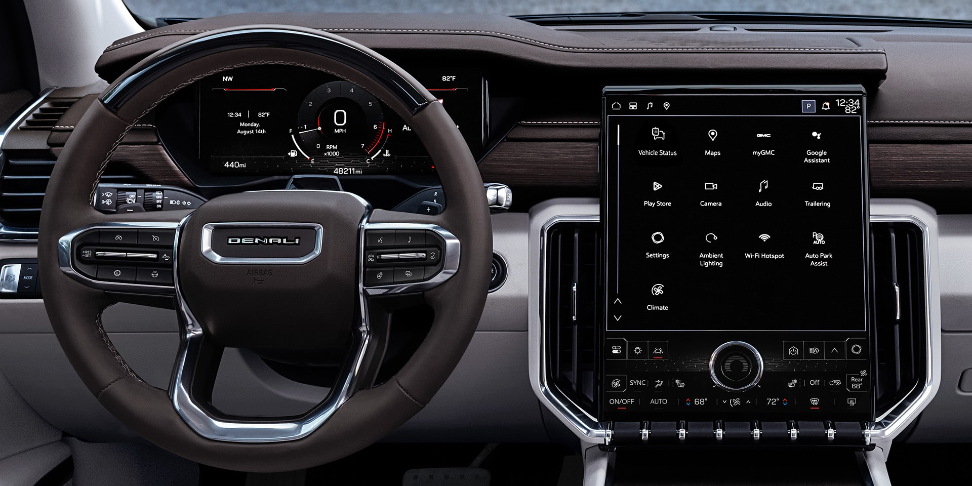 Close-up of the Steering Wheel and Infotainment System in a GMC