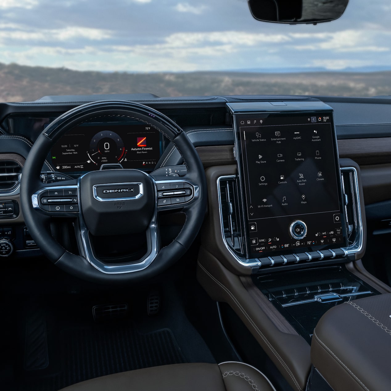 Interior View of the Steering Wheel and Infotainment Screen in the GMC Yukon Large SUV
