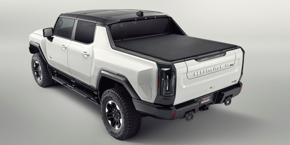 Rear Three-Quarters View of a 2025 White Hummer EV Pickup Truck