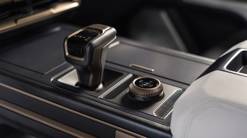 Close-Up of the Drive Mode Selector and Gear Shifter on the Center Console