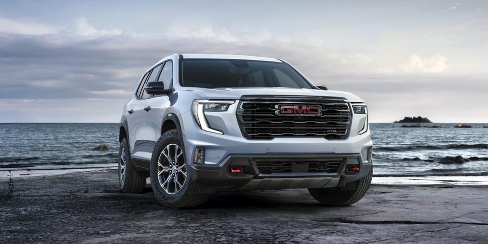 Front Three-Quarter View of the GMC Acadia AT4 Mid-Size Off-Road SUV Parked on the Beach