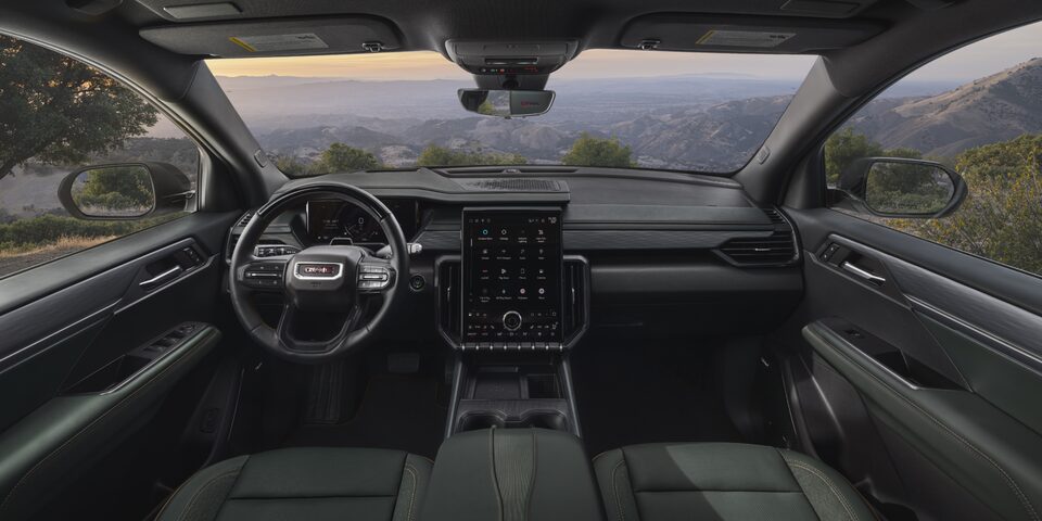 Interior View of the Acadia AT4 Mid-Size Off-Road SUV Steering Wheel, Infotainment System, and Dashboard