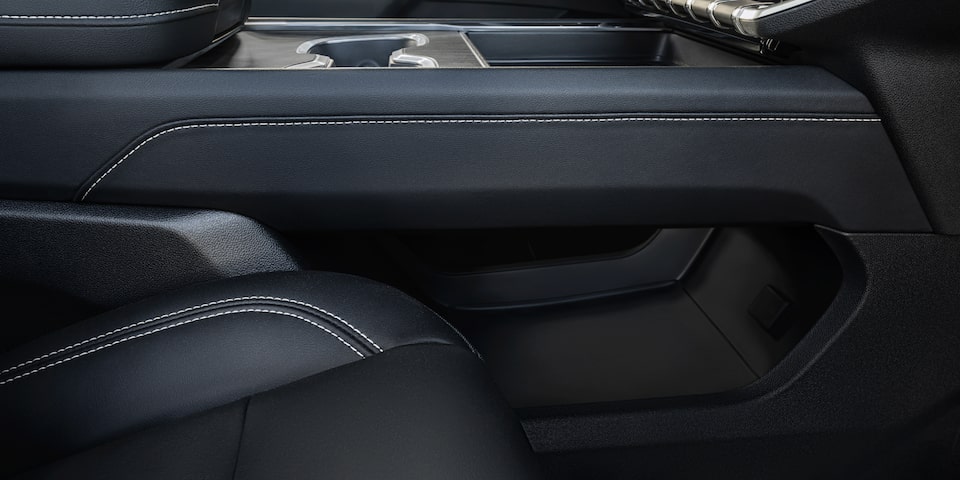 View of the Storage Under the Front Center Console in the GMC Acadia SUV