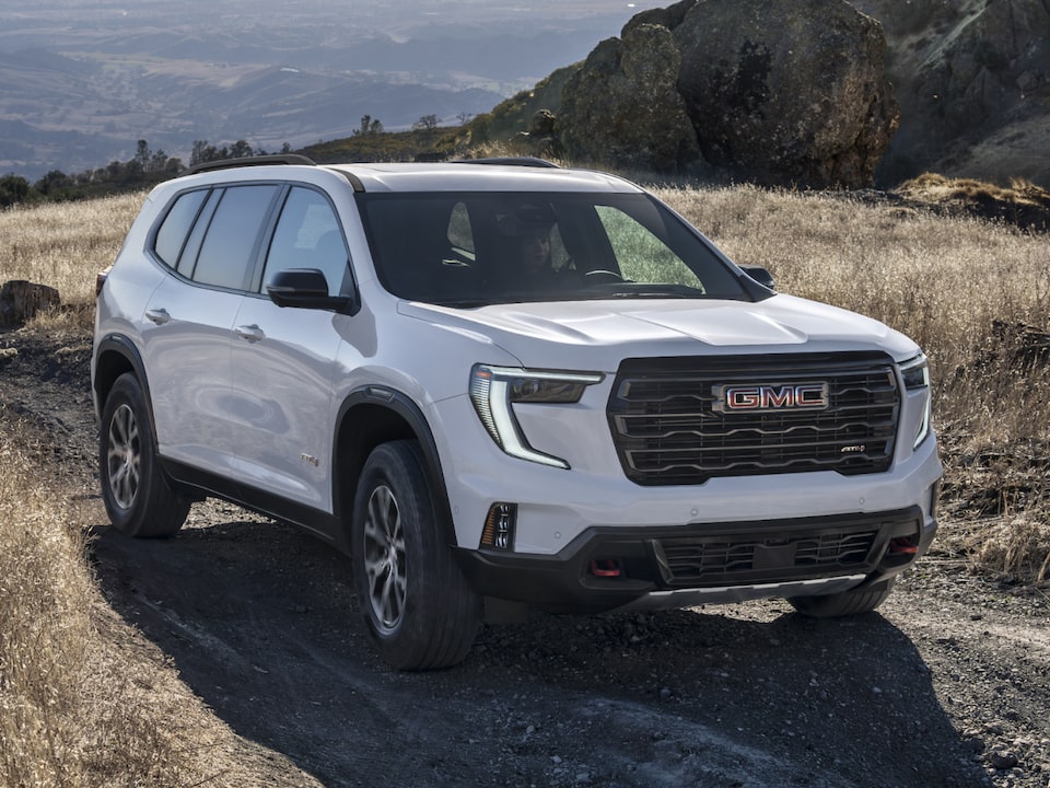 The GMC Acadia AT4 Mid-Size SUV Driving Off Road