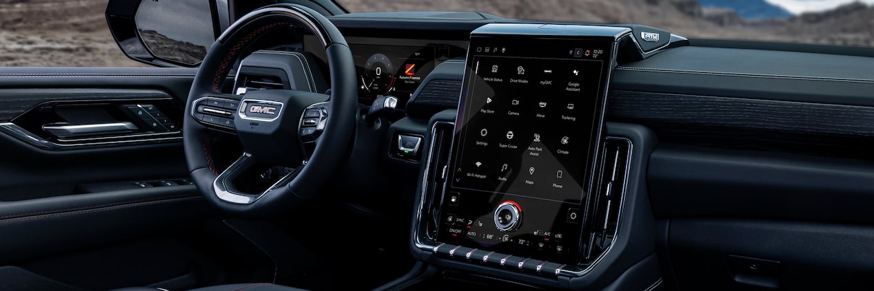 Passenger Side View of the GMC Yukon Steering Wheel and Infotainment System