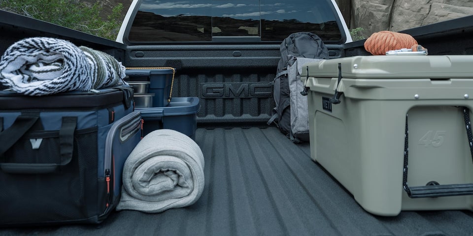 The 2025 GMC Canyon Versatile Cargo Bed Full of Camping Equipment